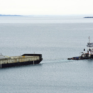 McKeil’s tug and barge sailing the shores of Newfoundland and Labrador
